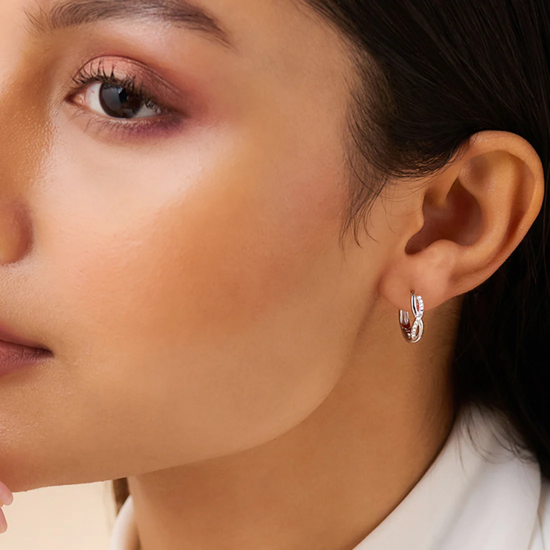 A Forever Promise Huggie Hoop
Rhodium Plated Earrings - Image 3