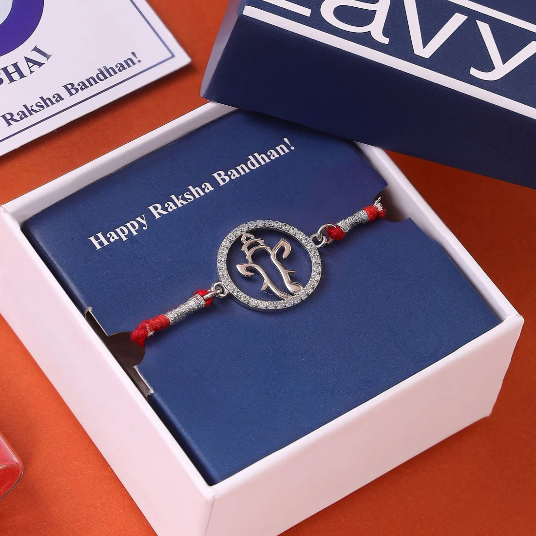 Radiant Ganesh Ji With Cubic Zirconia Rhodium-Plated Silver Thread Rakhi For Him - Image 2