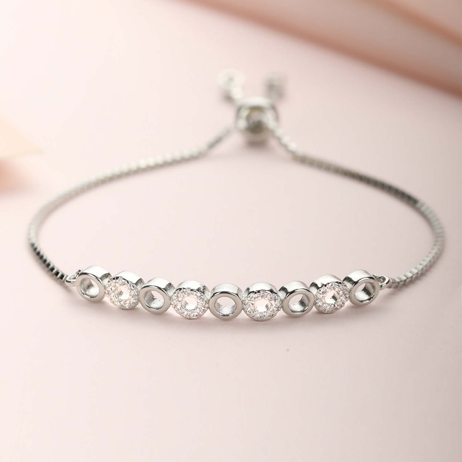 Ringing in Style 925 Silver Bracelet